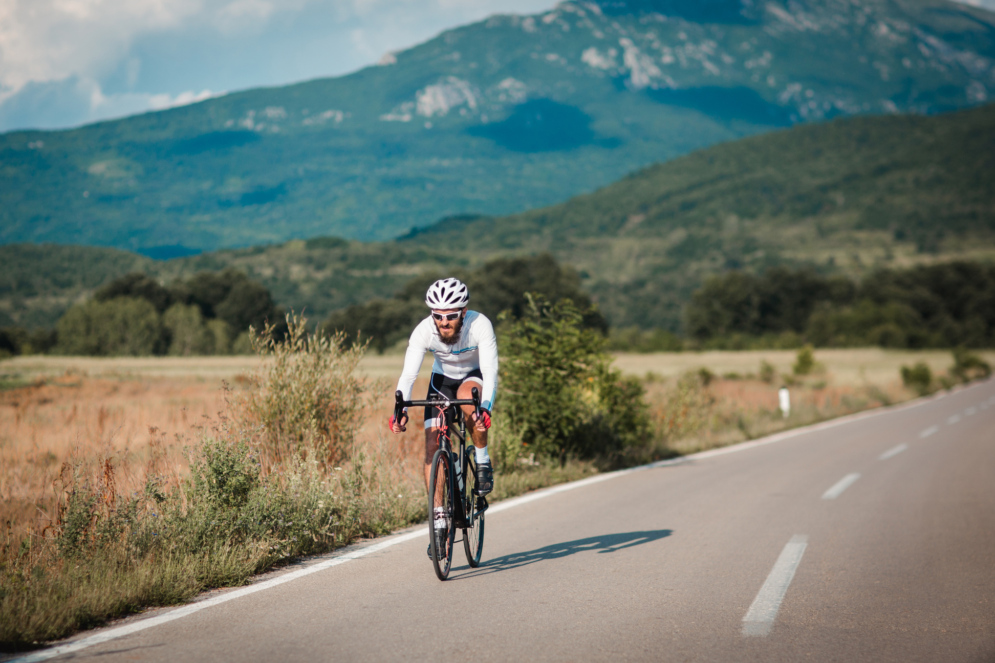 Roadbikeman cycling down the road